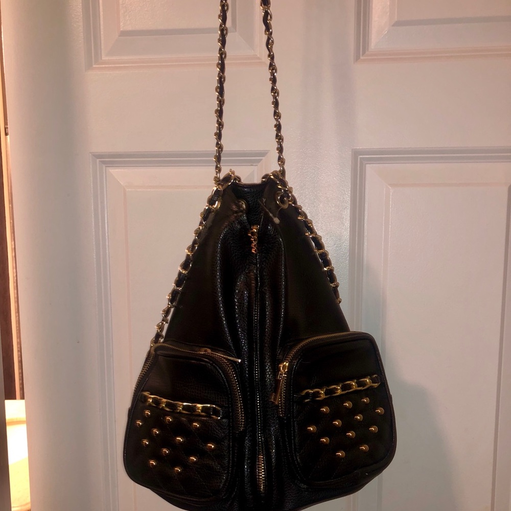 black and gold mini backpack